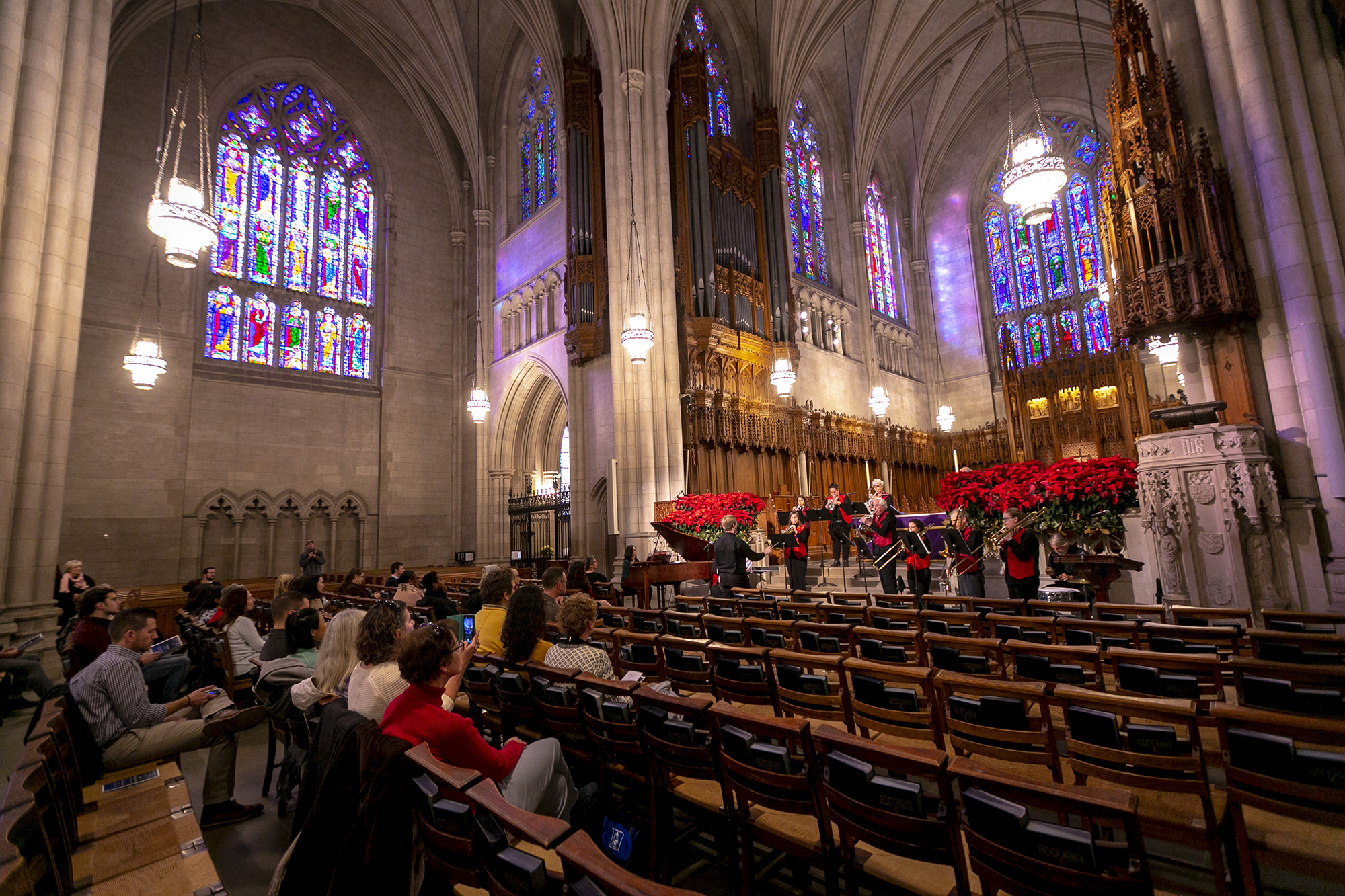 brass band ensemble performing in University Chapel